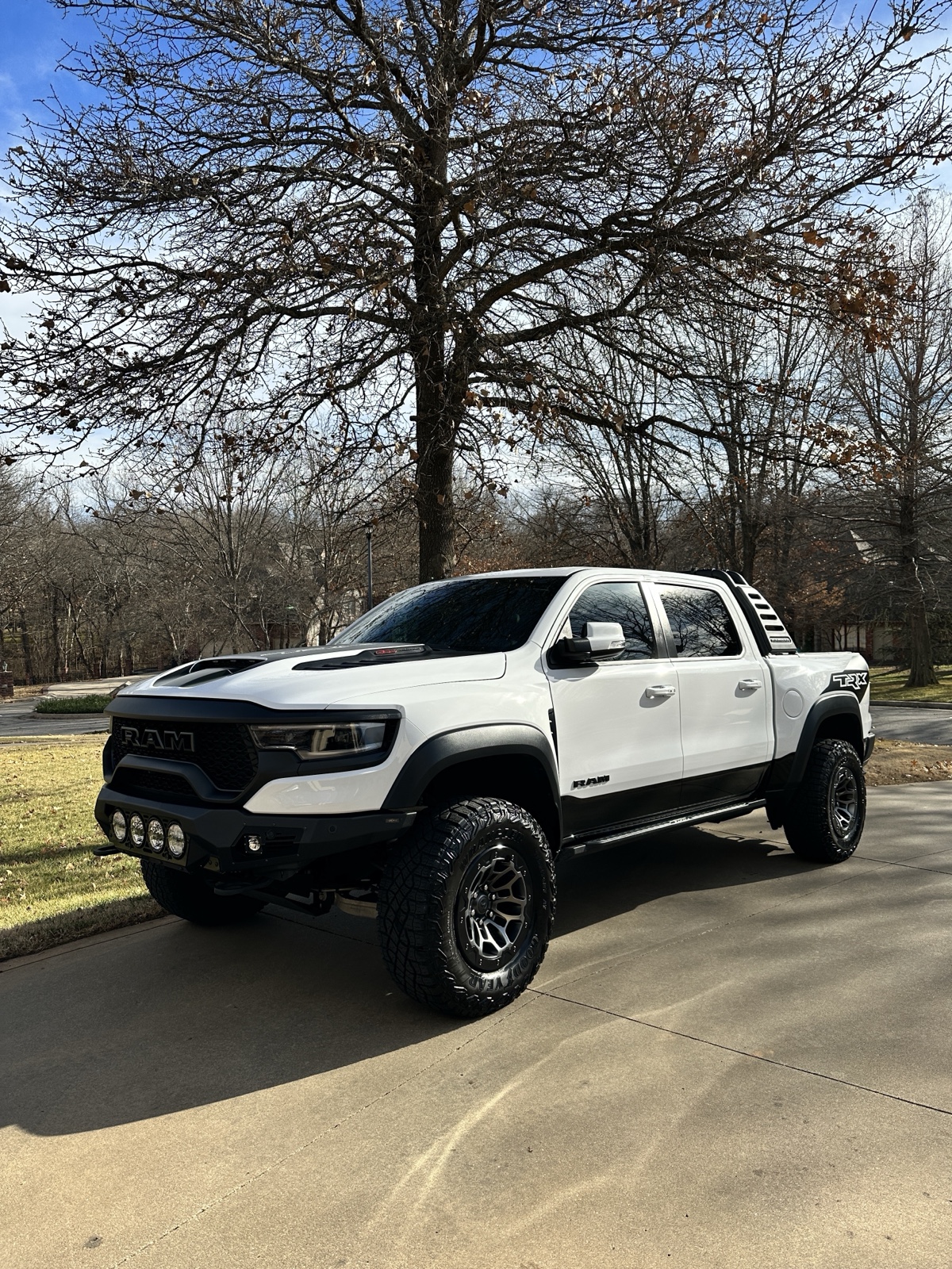 His actual RAM TRX, a real driveway photo